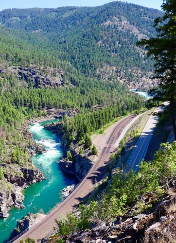 an aerial view of a road and a river at Evergreen Motel in Libby