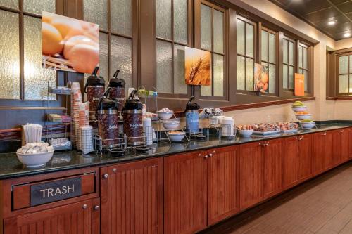 a buffet line in a restaurant with food at Comfort Suites Downtown Carlisle in Carlisle