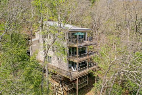 an aerial view of a tree house in the woods at Falcons Nest in McCaysville