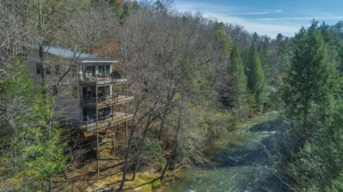 an aerial view of a house in the woods at Falcons Nest in McCaysville