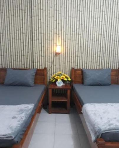 Llit o llits en una habitació de Villa Asri