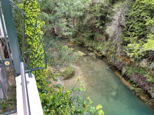 a view of a river from a train at MOULIN DE L'OULETTE in Soubès