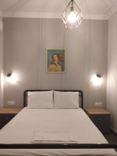 Postel nebo postele na pokoji v ubytování Gianni's Apartment 1 by the Sea