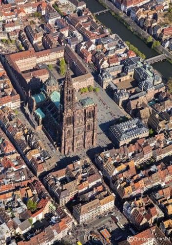 an aerial view of a city with a tall building at Hotel Suisse in Strasbourg