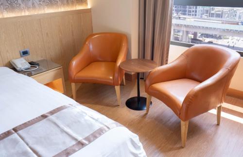 Un lugar para sentarse en HE TI Hotel