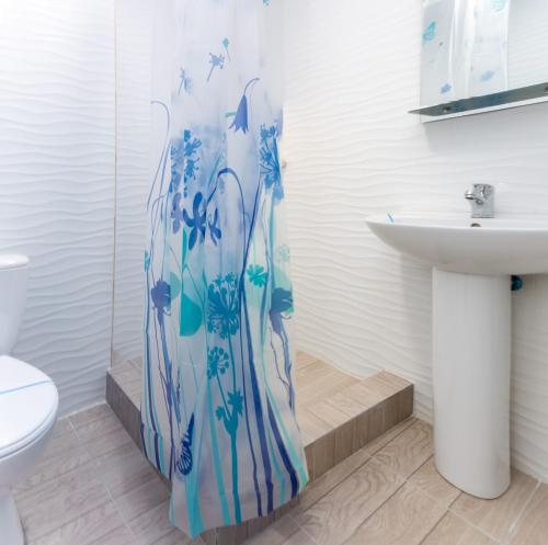 Koupelna v ubytování Zenith Hotel