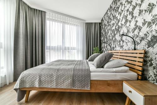 Posteľ alebo postele v izbe v ubytovaní LTC-Apartments Portova