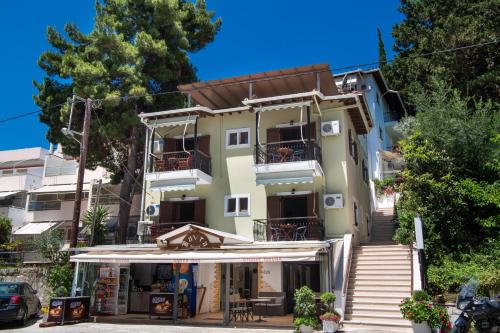 a building with stairs leading up to it at Mavra Studios in Lygia