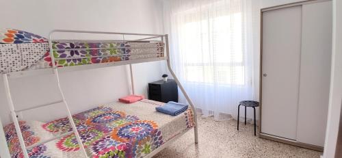 Katil atau katil-katil dalam bilik di Nice apartment near the port of Santa Pola
