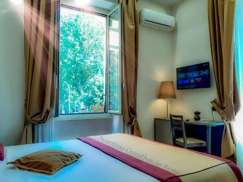 Katil atau katil-katil dalam bilik di Aventino Guest House