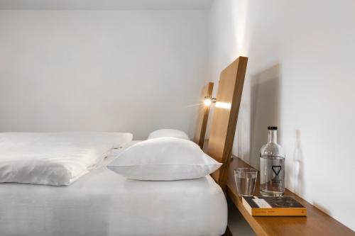 Кровать или кровати в номере Ciasa de Munt Lifestyle Living