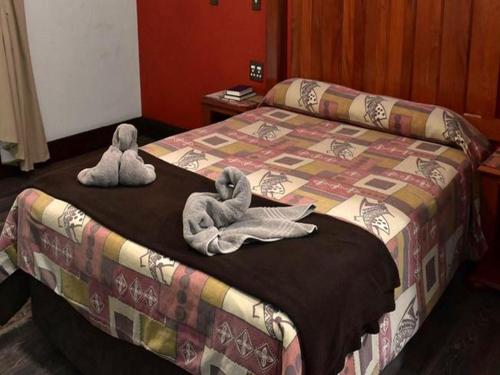 Ένα ή περισσότερα κρεβάτια σε δωμάτιο στο Golden Pillow Guest House