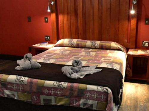 Ένα ή περισσότερα κρεβάτια σε δωμάτιο στο Golden Pillow Guest House