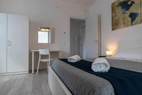 A bed or beds in a room at Numero 53 Tenna OSPITAR