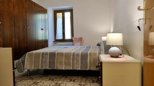 Posteľ alebo postele v izbe v ubytovaní Casa alla Cantinota Padergnone Ospitar