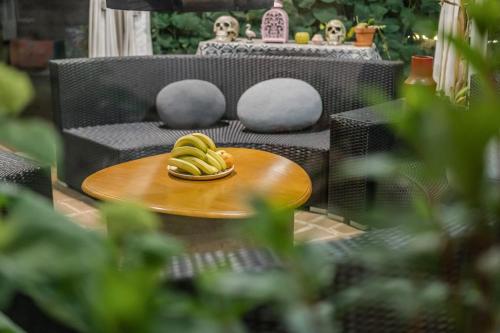 a bunch of bananas sitting on a table at Baisha Flamingo Hotel in Lijiang