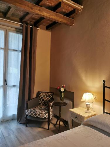 Postel nebo postele na pokoji v ubytování Agriturismo Airale