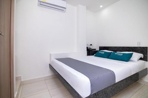 Hotel Esperanza ACにあるベッド