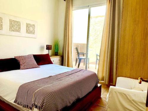 Posteľ alebo postele v izbe v ubytovaní Ed Senses Apartamento Wellness
