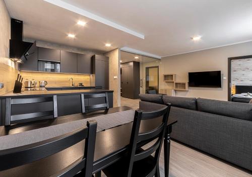 Kuchyň nebo kuchyňský kout v ubytování Gesto Apartments