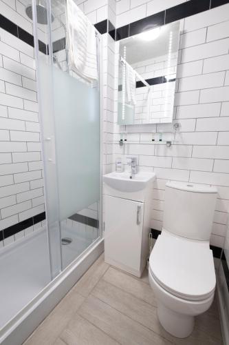 Ένα μπάνιο στο Cromer Guest House
