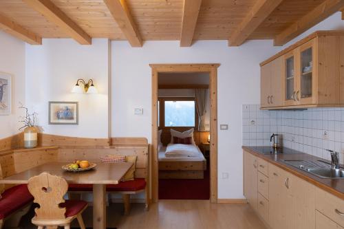 Kuchyň nebo kuchyňský kout v ubytování Apartments Etruska Gabriela