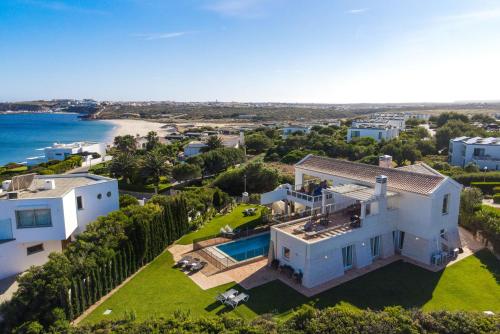 an aerial view of a house with the ocean at Villa Ocean Blue in Sagres