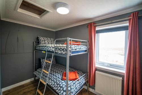 Postel nebo postele na pokoji v ubytování Burnside Cottage