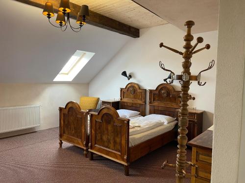 Un pat sau paturi într-o cameră la Guest House Hena