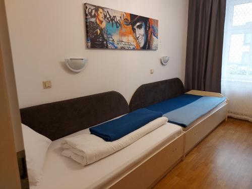 Ένα ή περισσότερα κρεβάτια σε δωμάτιο στο Appartements Andrea