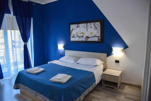 Postel nebo postele na pokoji v ubytování Mirosa Bed and Breakfast