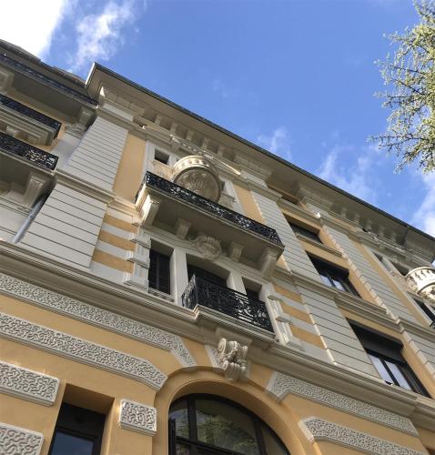 a building with a clock on the top of it at Studio 329 in Aix-les-Bains