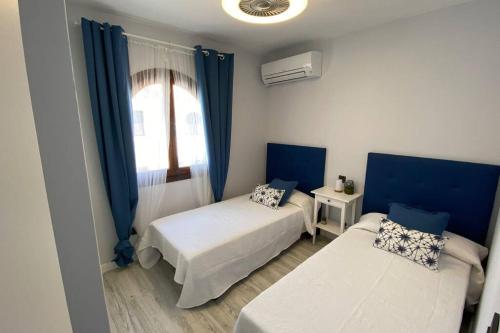 Cama o camas de una habitación en Duplex a 50 metros del Mar Mediterraneo
