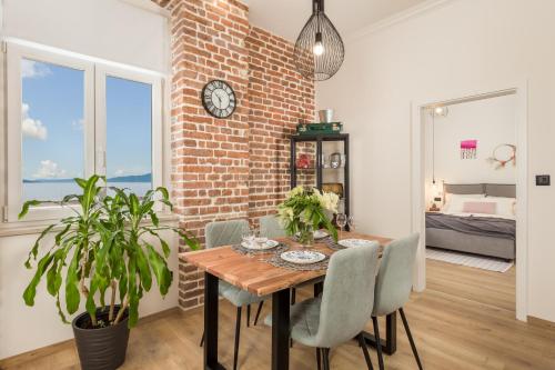 Postel nebo postele na pokoji v ubytování Apartment Vintasio