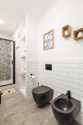Koupelna v ubytování Apartment Vintasio