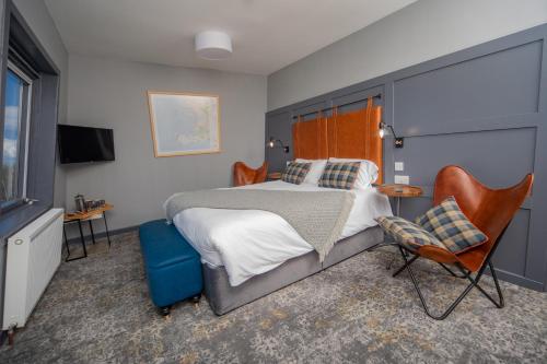 Кровать или кровати в номере Hebridean Inn