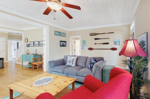 a living room with a couch and a table at Looney Dunes in Lincoln City