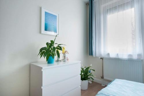 Ένα ή περισσότερα κρεβάτια σε δωμάτιο στο Pearl Home