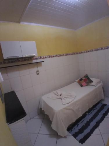 Ένα ή περισσότερα κρεβάτια σε δωμάτιο στο Chapada Casas da Izete