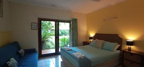 Cama o camas de una habitación en Daintree Rainforest Retreat Motel