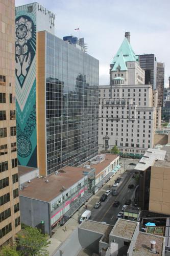 a view of a city street with tall buildings at Your Vacation Home Downtown Vancouver in Vancouver