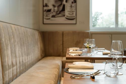 a dining room with a table with glasses and napkins at Grand Hotel San Gemini I UNA Esperienze in San Gemini