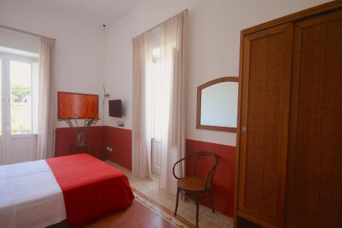 A bed or beds in a room at Villa le Pigne