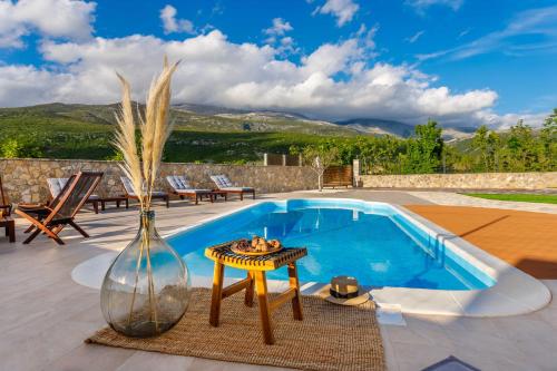 Φωτογραφία από το άλμπουμ του Stone House Korita σε Otok