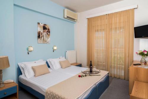 Postel nebo postele na pokoji v ubytování Hotel Europe