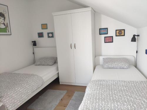 Кровать или кровати в номере House-Apartment More