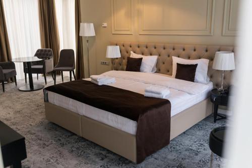 Letto o letti in una camera di Time Hotel&SPA