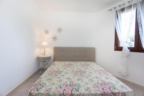 Postel nebo postele na pokoji v ubytování Oasi del relax