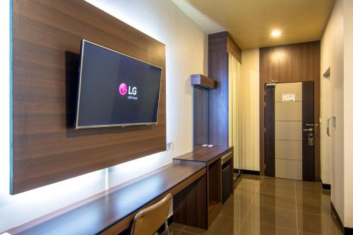 TV a/nebo společenská místnost v ubytování PSG Hotel