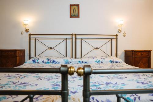 Un ou plusieurs lits dans un hébergement de l'établissement Albergo Diffuso Polcenigo Casa Rigo